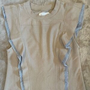 Anthropology top with amazing details. Strips, ruffles and buttons